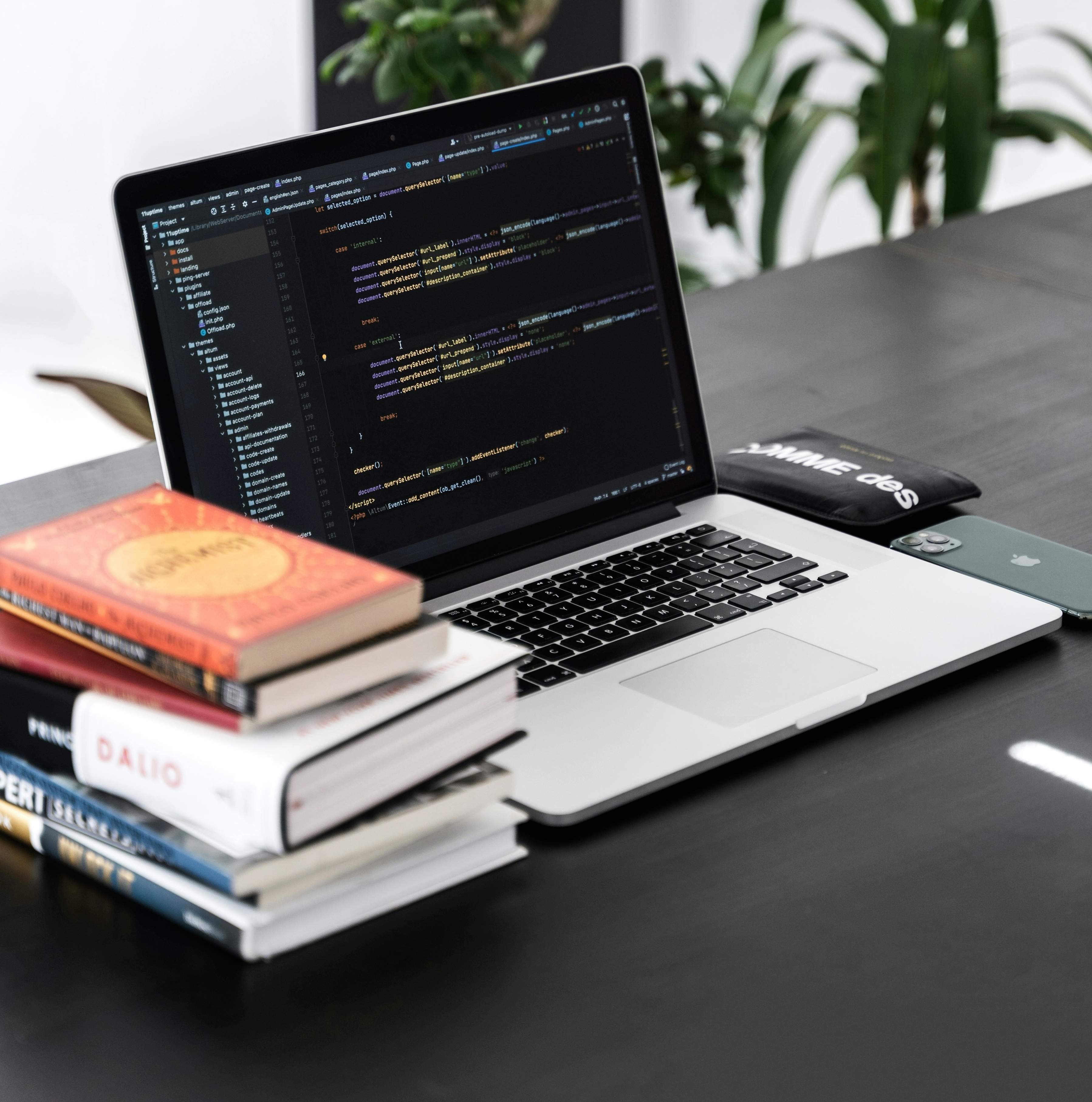 Coding workspace with books